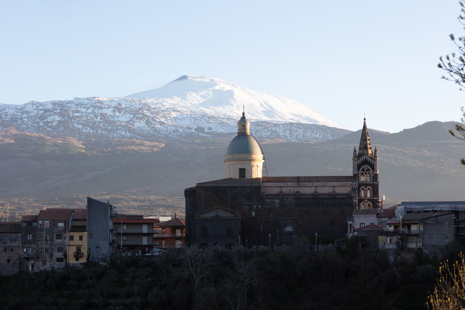 Volcano above a hill town, before